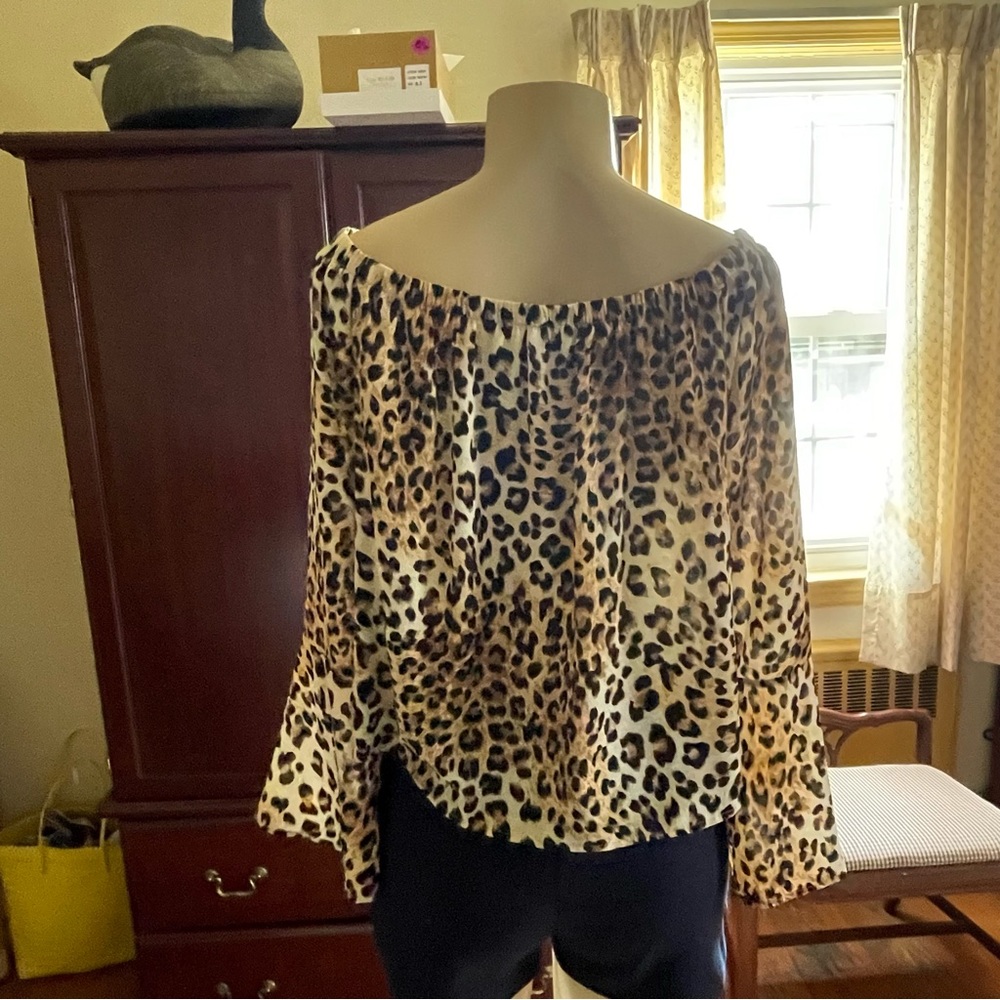Off the shoulder leopard print with bell sleeves for your nights on the prowl